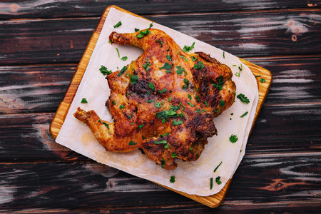 roasted chicken Piri Piri with parsleyの写真素材