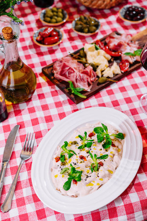 salad with seafood and Italian antipastiの写真素材