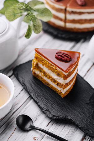 Delicious cheesecake with caramel and walnutsの写真素材