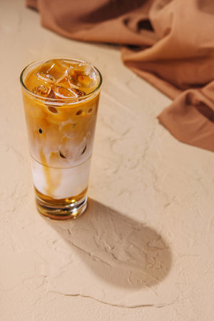 Iced coffee with ice cubes top viewの写真素材
