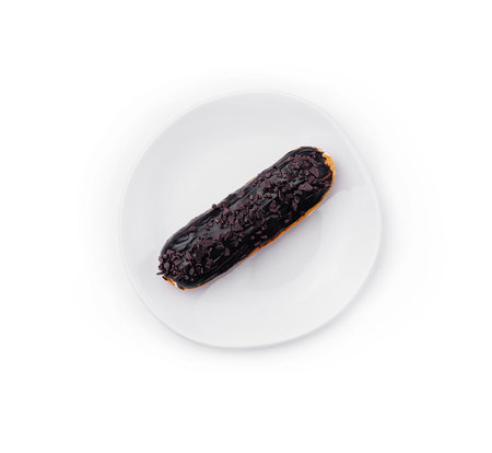 Cake eclair glazed with chocolate cream top viewの写真素材
