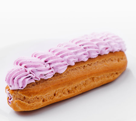 Fresh tasty eclairs isolated on white backgroundの写真素材