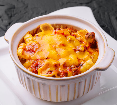 Macaroni and cheese baked on plateの写真素材