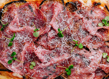 rectangular pizza with eggplant and prosciuttoの写真素材