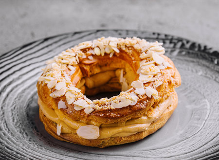 round cake with mendal and custard