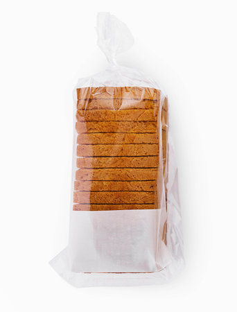 top view of white sliced toast bread on whiteの写真素材