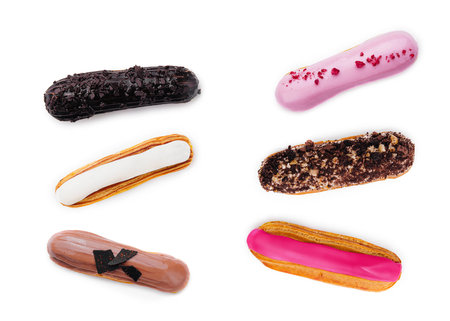 different types of French eclairs isolated on white