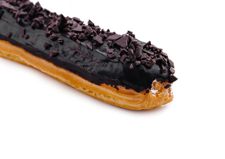 delicious chocolate French eclair on whiteの写真素材