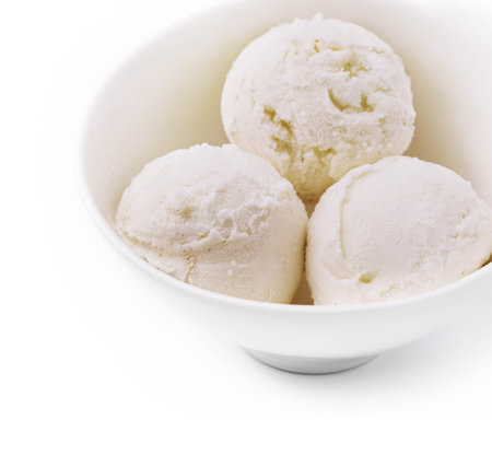 Sweet creamy ice cream in bowl on whiteの写真素材