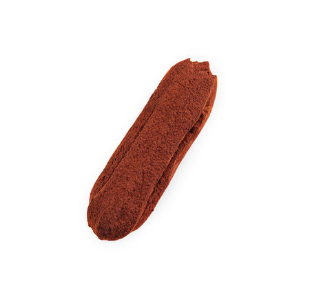 Isolated top view of a chocolate-dusted eclair on a clean white background