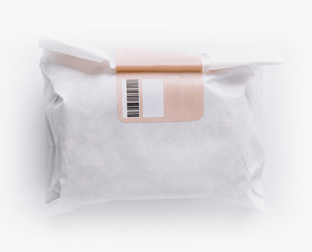 Top view of a generic wrapped package on a white backgroundの写真素材