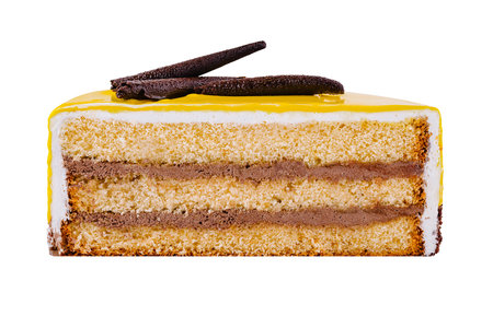 Mouthwatering slice of cake with layers of sponge cake and chocolate cream, topped with yellow icing...
