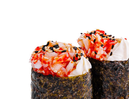 Two delicious gunkan sushi pieces are presented, featuring tobiko and spicy mayo, creating a visually appealing culinary experienceの写真素材