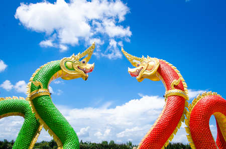 dragon or naga statue with blue sky
