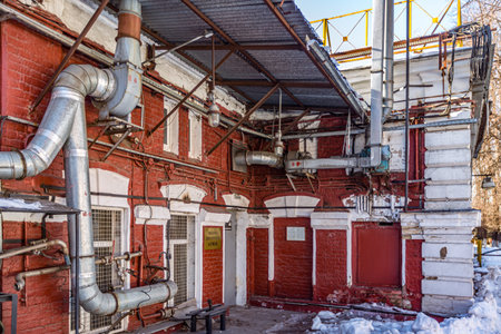 Industrial buildings of an old red brick factory in Moscow, Russiaの写真素材
