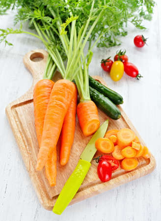 Fresh vegetables on the cutting boardの写真素材
