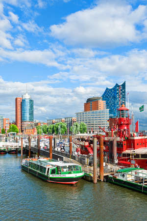 HAMBURG, GERMANY - AUGUST 5: View of the Port of Hamburg and Elbe river with new building of Elbe Philharmonic Hall (Elbphilharmonie) in the background on August 5, 2016 in Hamburg, Germanyのeditorial素材