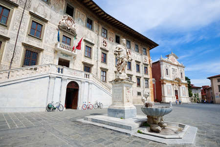 PISA, ITALY - JUNE 29: The Knightsâ Square ( Piazza dei Cavalieri ) with Palazzo della Carovana and statue of Cosimo I de' Medici in the center of old town on June 29, 2016 in Pisa, Italyのeditorial素材