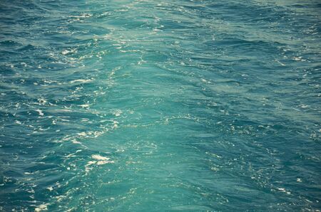 Blue sea surface water and waves background