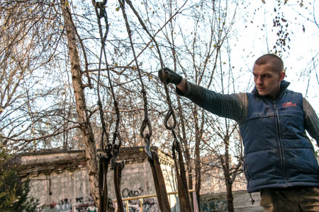 Dnepropetrovsk, Ukraine - 11.24.2021: Loading sandbags for the renovation of an apartment in a five-story building.のeditorial素材