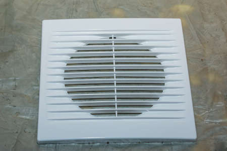Parts of a kitchen exhaust fan after cleaning and washing. The process of cleaning a very dirty exhaust fan.の写真素材
