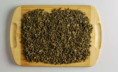 Green tea with sustain. Background of tea on a wooden board.の写真素材