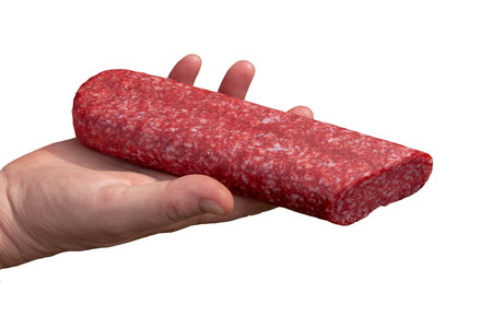 Sausage in the hand of a middle-aged woman. The concept of the world food crisis associated with the war in Ukraine. isolated on white background.の写真素材
