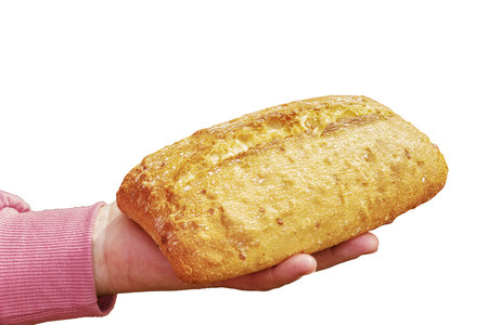 Bread in the hand of a middle-aged woman. The concept of the world food crisis associated with the war in Ukraine. isolated on white background.の写真素材