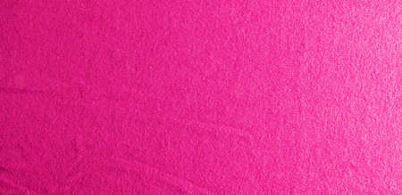 Lilac-pink knitted carpet close-up. Textile texture on a lilac-pink background. Detailed warm yarn background. Natural wool fabric, sweater fragment.の写真素材