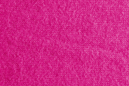 Realistic illustration of a lilac-pink knitted carpet close-up. Textile texture on a lilac-pink background. Detailed warm yarn background. Natural wool fabric, sweater fragment.の写真素材