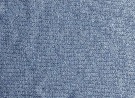 Realistic illustration of a gray-blue knitted carpet close-up. Textile texture on a gray-blue background. Detailed warm yarn background. Natural wool fabric, sweater fragment.の写真素材