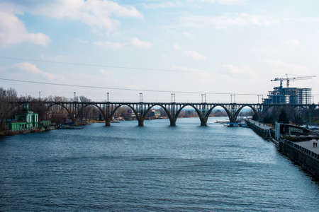 Structural elements of the old, built in the USSR, railway bridge across the Dnieper River.