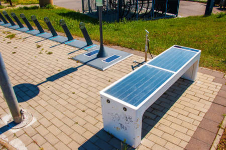 Solar panels in the bike park. alternative energy sources. energy crisis.