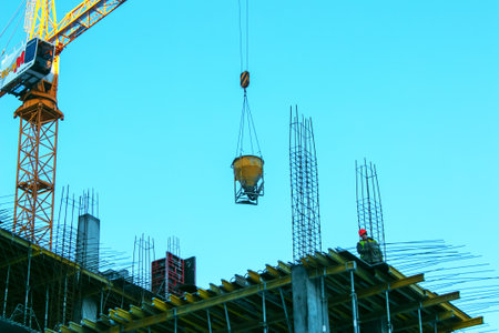 Dnipro, Ukraine - 02.15.2021: A construction crane against the background of a stormy sky. The real...