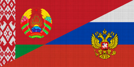Flags of Russia and Belarus on textured fabric. Concept of cooperation between two countriesの写真素材