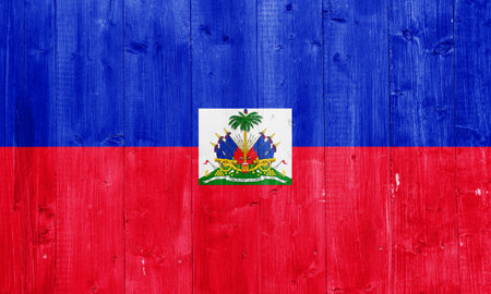Flag of the Republic of Haiti On the texture of wooden planks.の写真素材