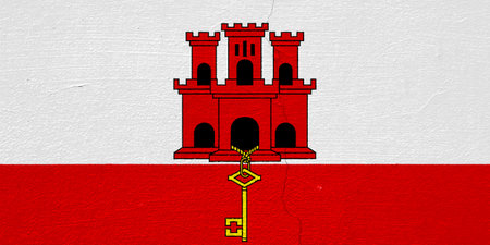 Gibraltar flag on a textured background. concept collage.の写真素材