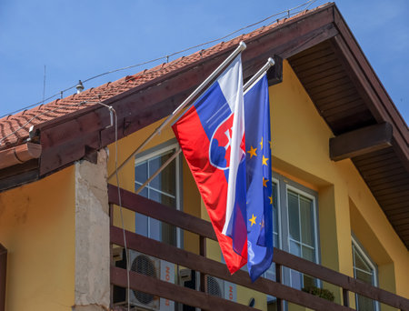 Nitra, Slovakia - 06.18.2022: Building with Slovakia and European Union flagsのeditorial素材