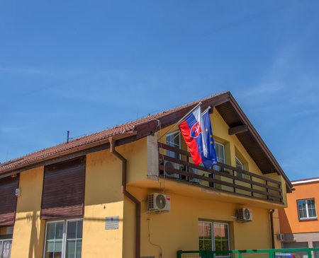 Nitra, Slovakia - 06.18.2022: Building with Slovakia and European Union flagsのeditorial素材