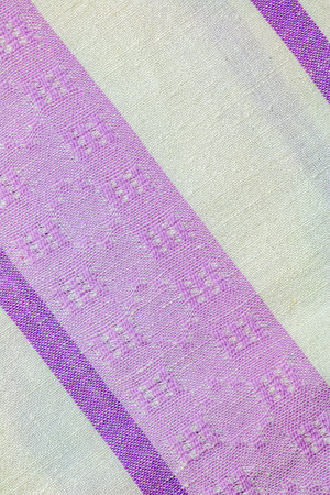 Closeup detail of multi color fabric texture samples.
