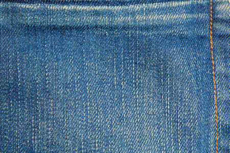 Textured old blue worn jeans - trendy jeans design. details.の写真素材