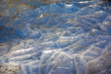 Ice surface of the river. Texture of ice shards. winter background.の写真素材