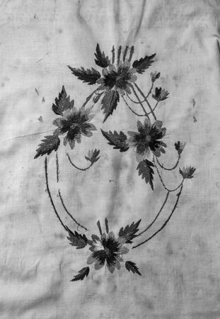 Towel with Ukrainian ethnic ornament, well embroidered with satin stitch, close-upの写真素材