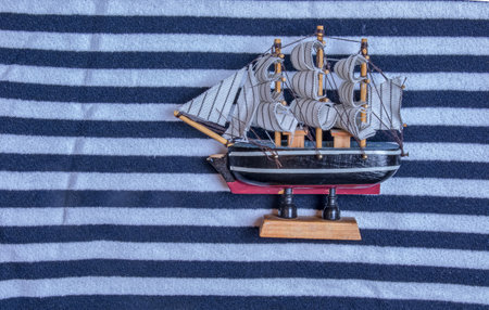Ship on the background marine textile texture for the background. Close-up of a marine textile...