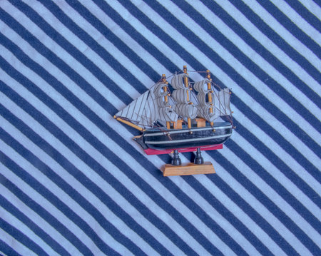 Ship on the background marine textile texture for the background. Close-up of a marine textile...