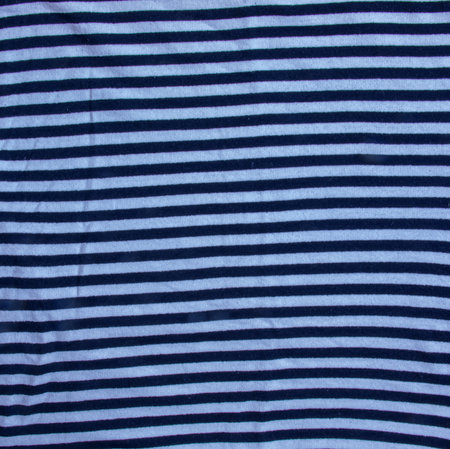 Nautical textile texture for background. Close up of a marine textile texture with blue and white...