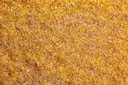 Raw bulgur background. Bulgur is a natural source of protein, fiber and fat. natural background. Health food.の写真素材