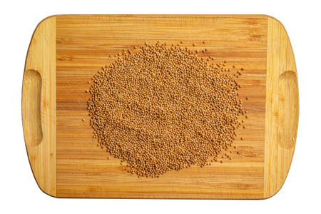 Background of whole mustard seeds. Mustard is widely used in many national cuisines.の写真素材