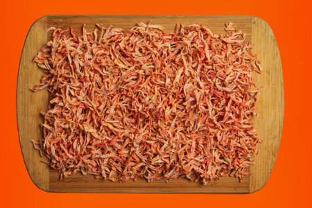 Organic Dehydrated Carrots. Freeze Dried Carrot Pieces. Air Dried Vegetables Dehydrated Carrot Slice Flakes Granules. carrot background.の写真素材