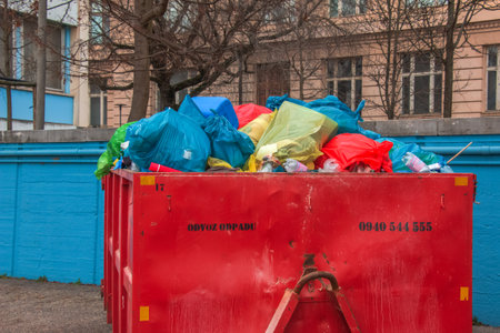 Slovakia, Bratislava - 08/01/2023: Container with garbage on the city street. Ecology concept.のeditorial素材